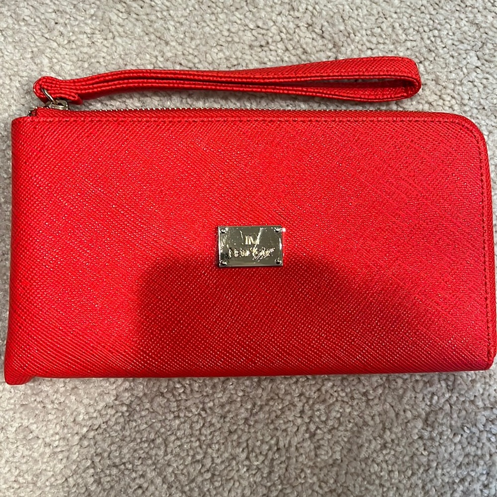 JM orange wristlet